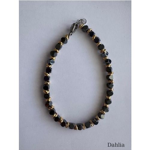 BRACCIALE CUBI GRANDI SCURI CON RONDELLE DORATE