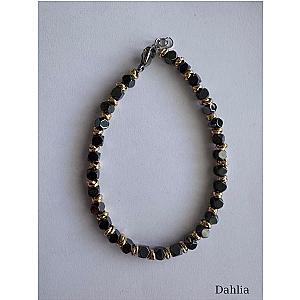 BRACCIALE CUBI GRANDI SCURI CON RONDELLE DORATE