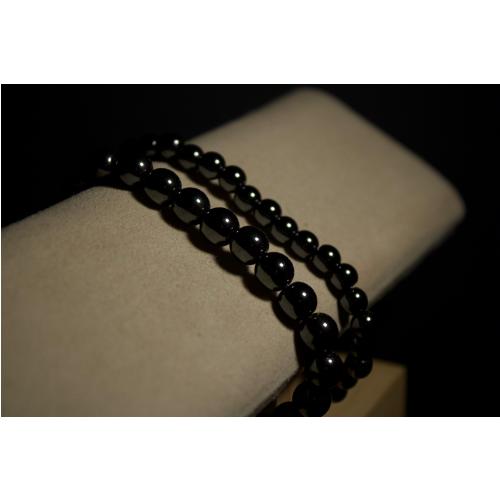 BRACCIALE CON SFERE IN EMATITE 