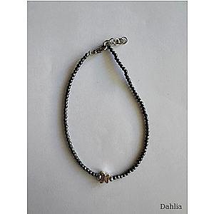 BRACCIALE EMATITE SOTTILE CON FARFALLA